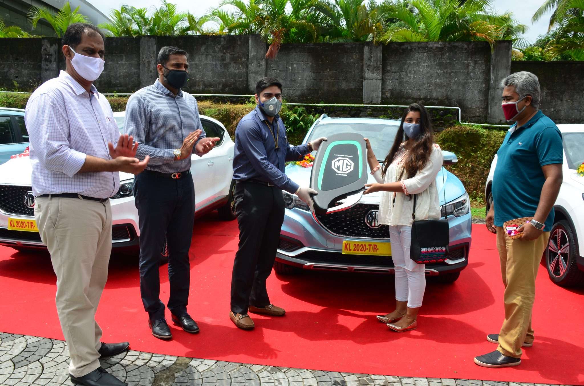 Kochi Dealer Delivers 11 MG ZS EVs In One Day Image Gallery